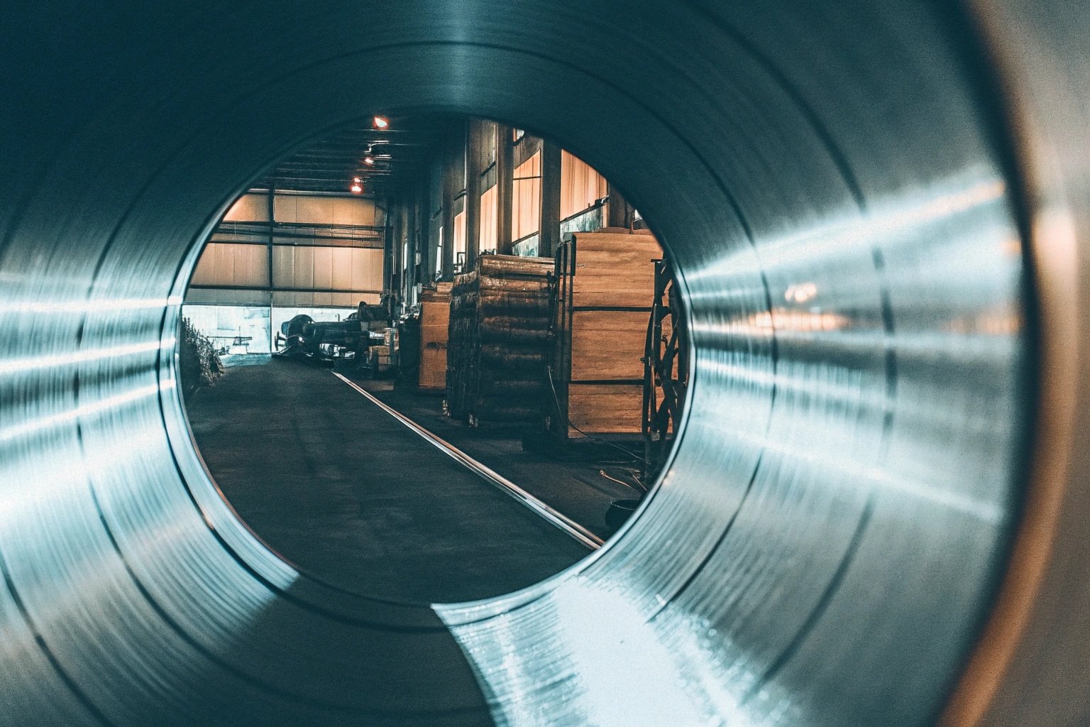 Workers inspecting tinplate sheets for scratches