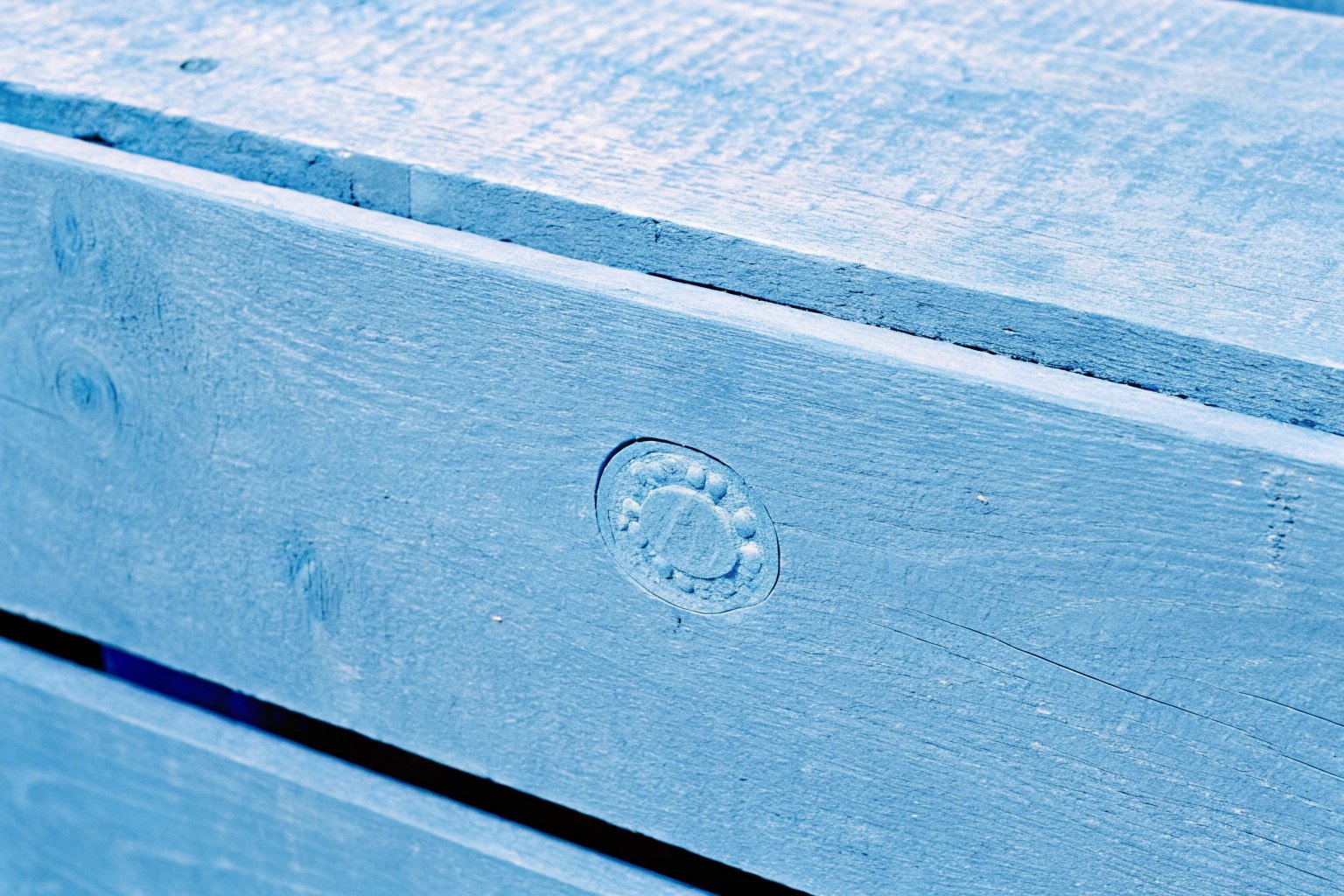 ISPM 15 stamped wooden pallet supporting steel coils