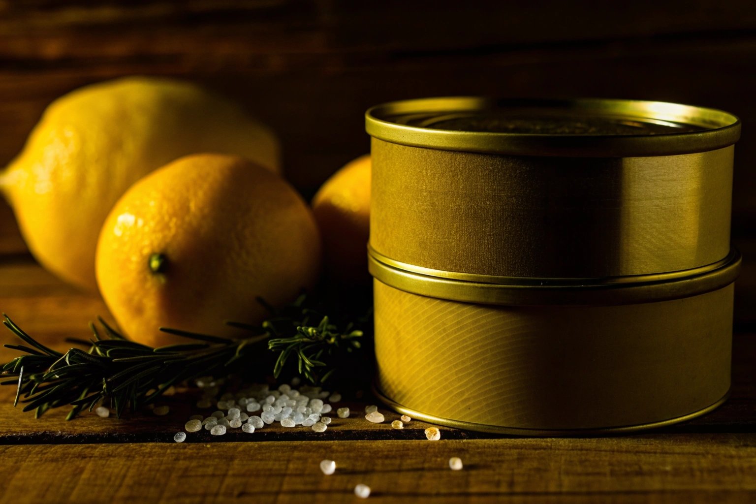 Stone finish tinplate cans next to bright finish cans