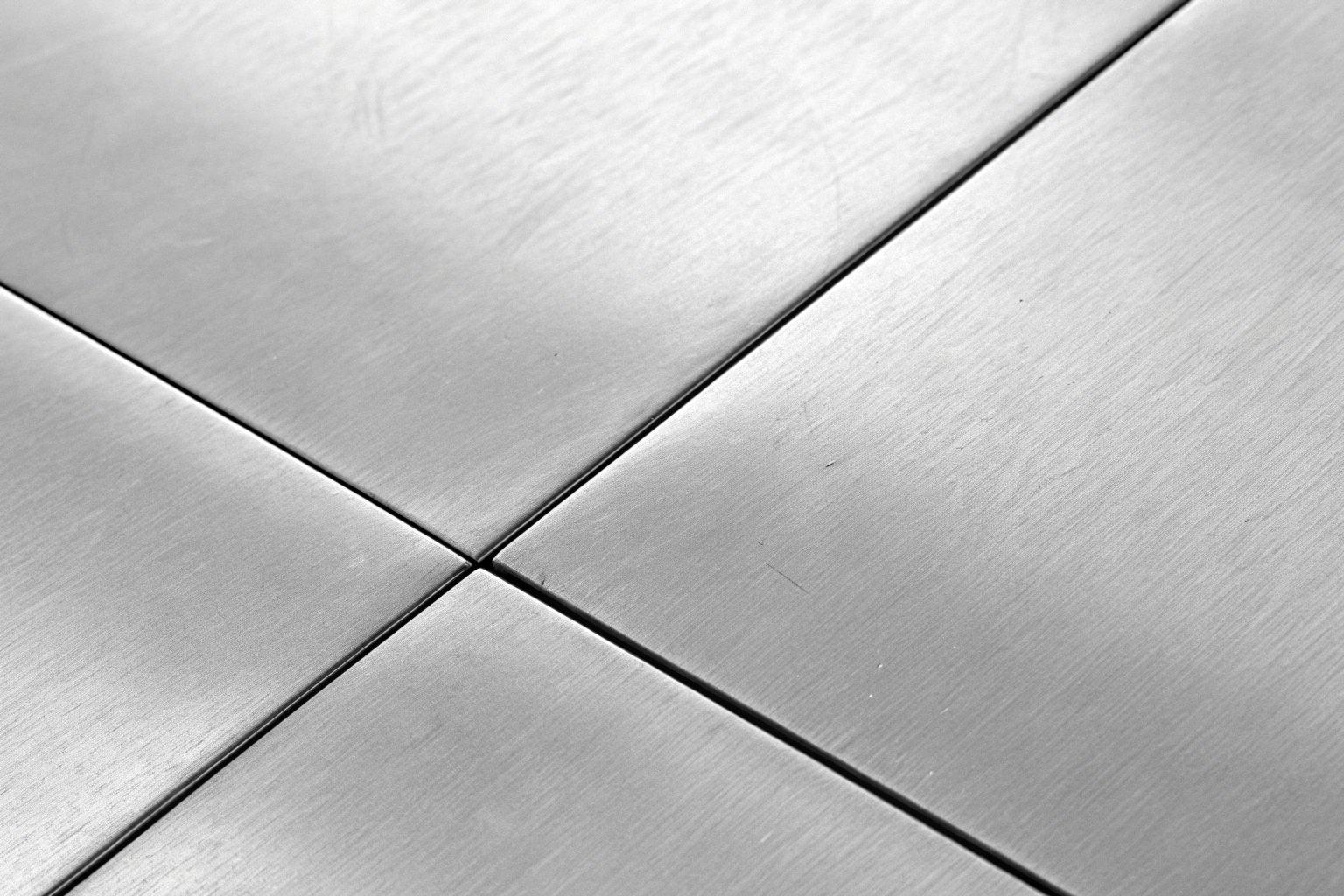 Close up of tinplate surface showing oil sheen